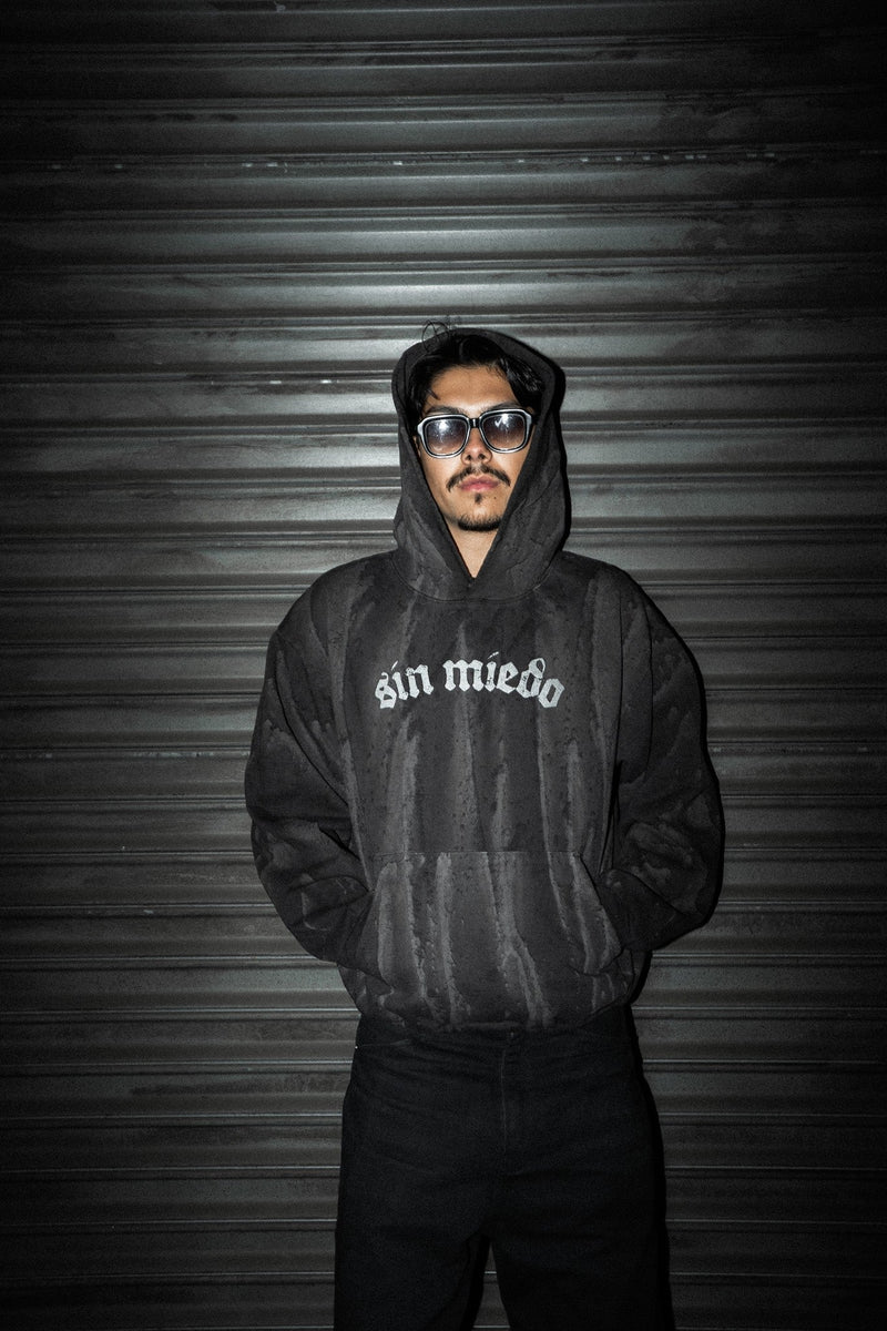 Black Drip Cemento hoodie, worn