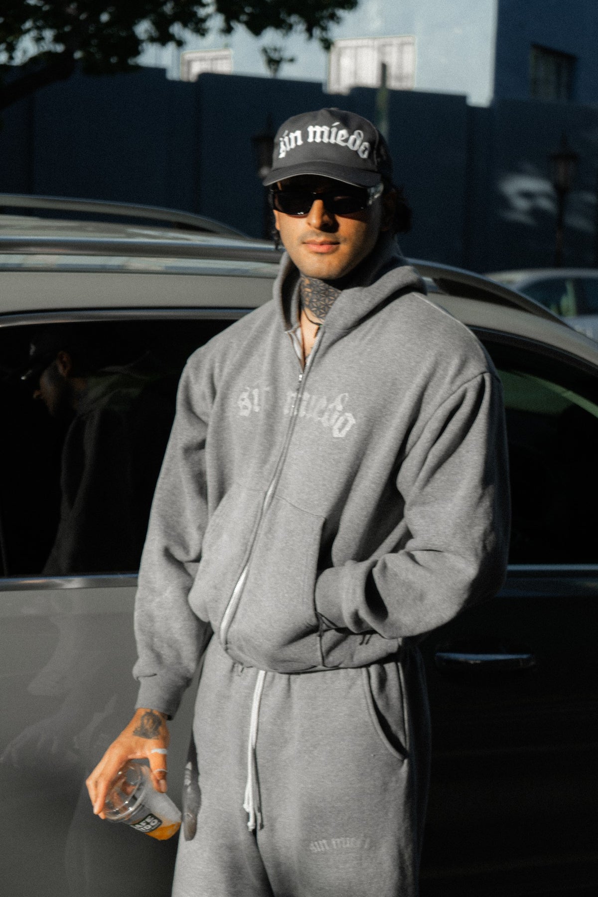 Grey Cemento zip up hoodie, close-up