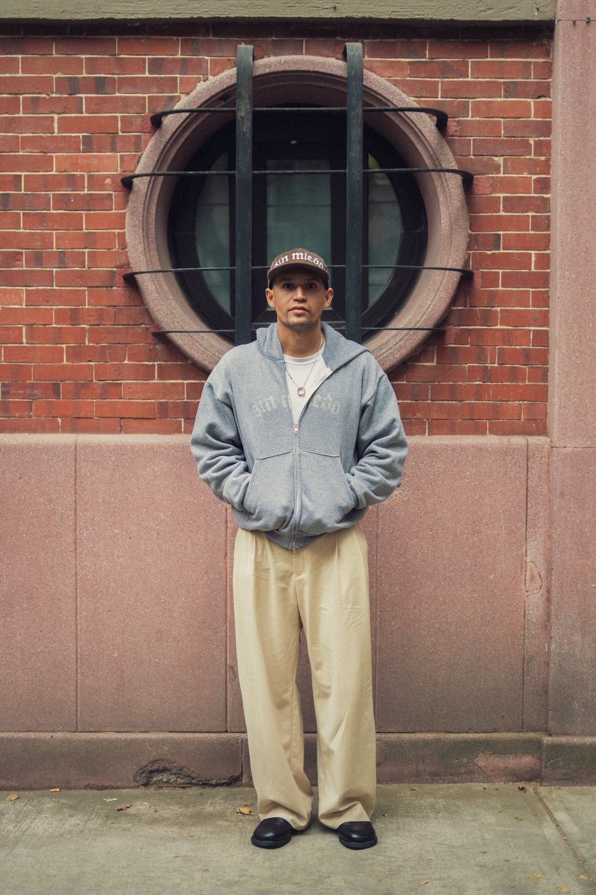 Grey Cemento zip up hoodie, styled on location